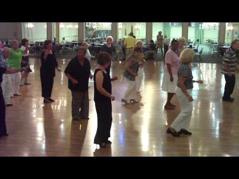 cumbia amore line dance. They are dancing quot;AH SIquot; to Te Quiero Mas. This Line Dance was choreographed by Rita Masur and is a popular dance at all our COPAs.