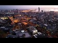 DRON, vuelo al final de la tarde sobre Montevideo, centro y puerto.1080p