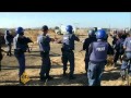 At least 12 people have been killed when police opened fire on miners staging a protest at a platinum mine in South Africa, according to the Reuters news agency.

South African police opened fire and dispersed a crowd of striking miners at the Lonmin mine in the North West province on Thursday after issuing an order to the protesters to lay down their machetes and sticks.

Al Jazeera\'s Tania Page reports.