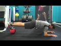 Plank Press with Feet on Medicine Ball