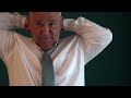 Demonstration Of A Full Windsor Tie Knot.