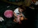 Kissing her baby doll, 3-3-07