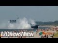 Russian Navy Hovercraft Lands On Busy Beach.