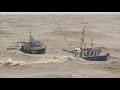 Incredible video - fishing boats in rough sea