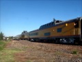 Union Pacific 844 steams past old CNW depot in Ames, Iowa