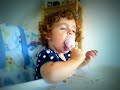 funny baby falling asleep while eating ice-cream