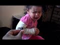 Funny baby gets scared by a fake spider prank