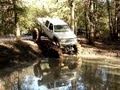 GIANT LIFTED BIG BLOCK CHEVY 4X4 on TRACTOR TIRES GOES DEEEEEEP!!