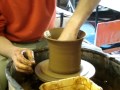 Throwing a very simple one pull plant pot on the wheel