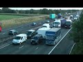 TRUCKS ON M6 MOTORWAY IN HEAVY TRAFFIC AUGUST 2011