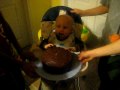 funny baby cohen eats cake on his first birthday