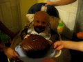 funny baby cohen eats cake on his first birthday