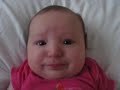 Baby going potty. Making funny faces and noises.