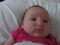 Baby going potty. Making funny faces and noises.