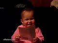 Baby's Reading A Newspaper Very Funny!
