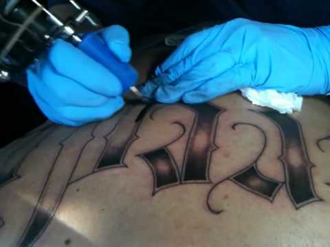 Carver Sampson aka Tattoo is seen here doing a rather large lettering 