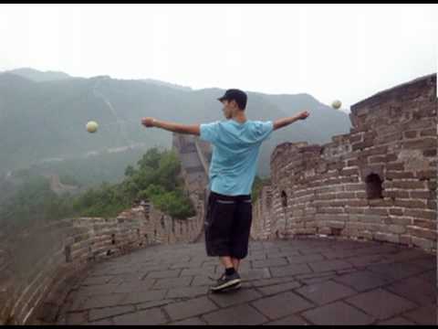 Tom playing poi on the Great Wall of China