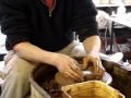 Throwing making a batch of clay pottery plant pots / flowerpots at speed / fast ...