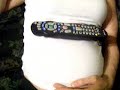 Baby kicking tunnmy! Funny!