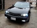 blacked out 2000 chevy impala