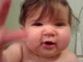 Angry Baby arguing with herself.