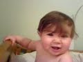 Angry Baby arguing with herself.
