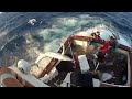 600lb Black Marlin Jumps in Boat and Lands on the Crew! Captured on 4 different cameras! Very Scary
