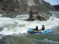 Whitewater Rafting - Class 5 Rapid Flip in Idaho - Flows approx. 17,000cfs on 4-19-09. He( a boater not associated with us)should have scouted and maybe probably portaged. His buddy took a nasty swim..But everybody was OK.. We lined our boats that day as we thought it was to high to run safely. Flows approx. 17,000cfs on 4-19-09. He( a boater not associated with us)should have scouted and maybe probably portaged. His buddy took a nasty swim..But everybody was OK.. We lined our boats that day as we thought it was to high to run safely.