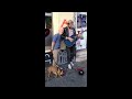 Streetmusician sings - Original singer comes along and joins him