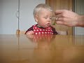 Cute baby sleeping and eating