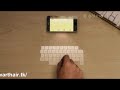 iPhone 5 concept includes laser keyboard, holographic projection,.avi