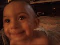 Funny baby falls off bed