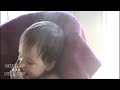 Baby Falls Asleep on First Birthday Cake
