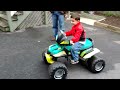 4 speed Modified Power Wheels drifting on pavement