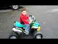 4 speed Modified Power Wheels drifting on pavement