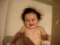 Funny baby in tub, amazing magical hair