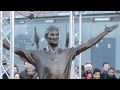 Arsenal unveil statues to three former greats