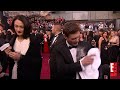 Sacha Baron Cohen Spills Ashes on Ryan Seacrest - 2012 Oscars