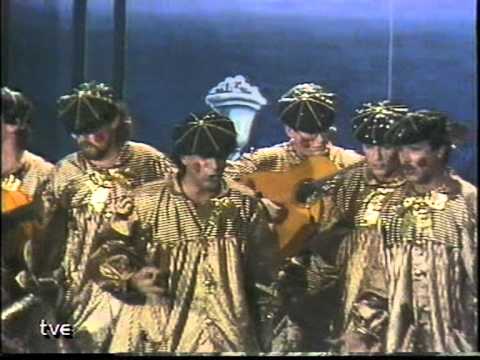 La agrupación Esto es carnaval llega al COAC 1987 en la modalidad de Comparsas. En años anteriores (1986) concursaron en el Teatro Falla como Locura, consiguiendo una clasificación en el concurso de Semifniales. 
