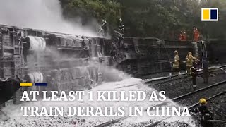 At least 1 killed and 127 injured as passenger train derails in China after hitting landslide