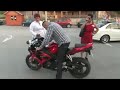 Idiot tries to spin back wheel of bike... then...