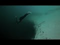Guillaume Nery base jumping at Dean's Blue Hole, filmed on breath hold by Julie Gautier