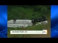 Tour bus lands upside down in crash