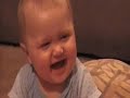 Funny baby Twins laughing so hard they fall over