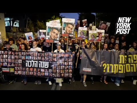 Families of Oct 7 hostages stay silent during siren near Netanyahu's residence