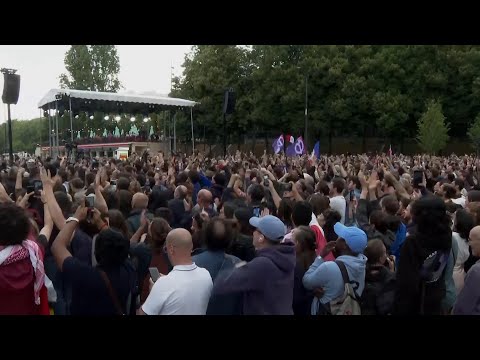 Melenchon supporters celebrate as French leftists win most seats in legislative election, pollsters