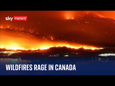 Wildfires rage in Canada after crossing US border