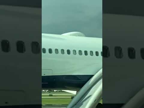 Passengers evacuate plane after tires pop