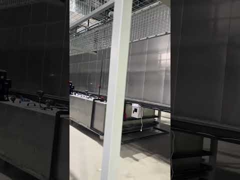 The spray-type pretreatment line is undergoing trial operation with automatic water level control.