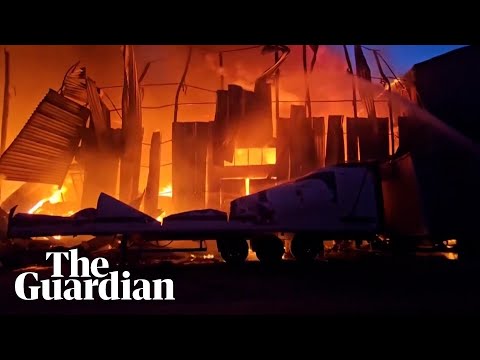 Ukraine: warehouse holding aid supplies burns to ground after Russian attack